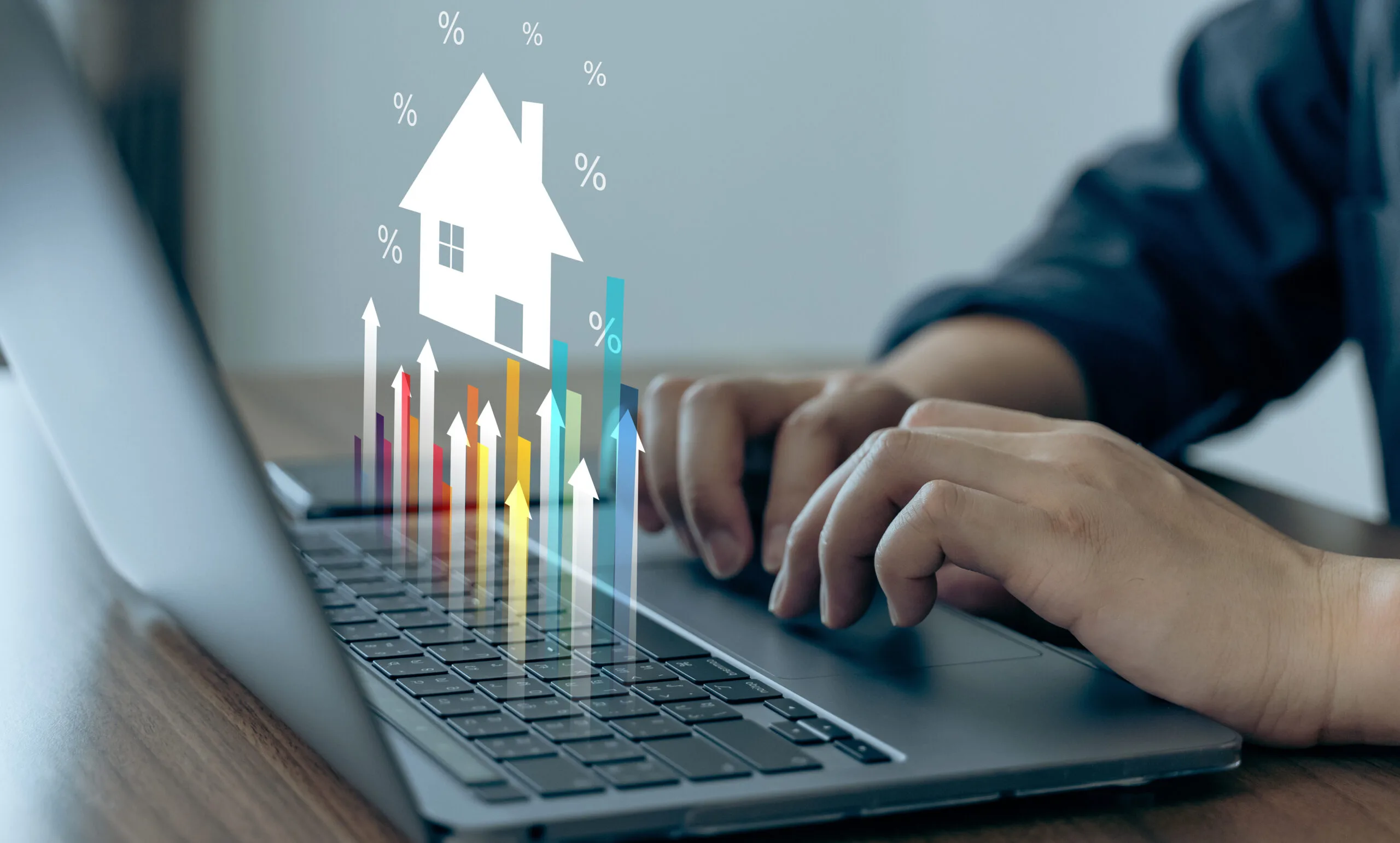 What are the rent increase laws in Texas and what can you do about them? A look at house and rent prices on a laptop.