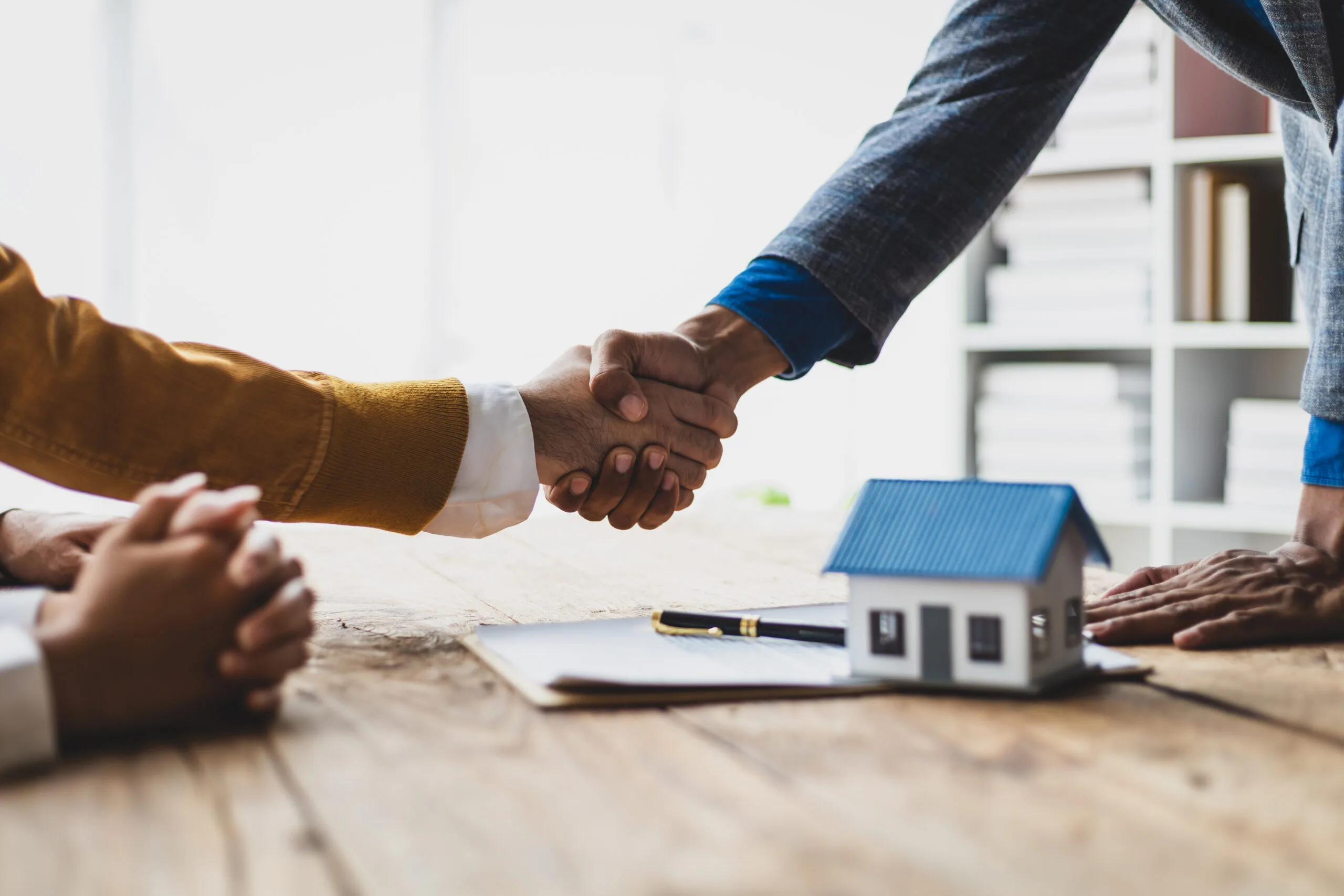 Legally signing a real estate agreement. 