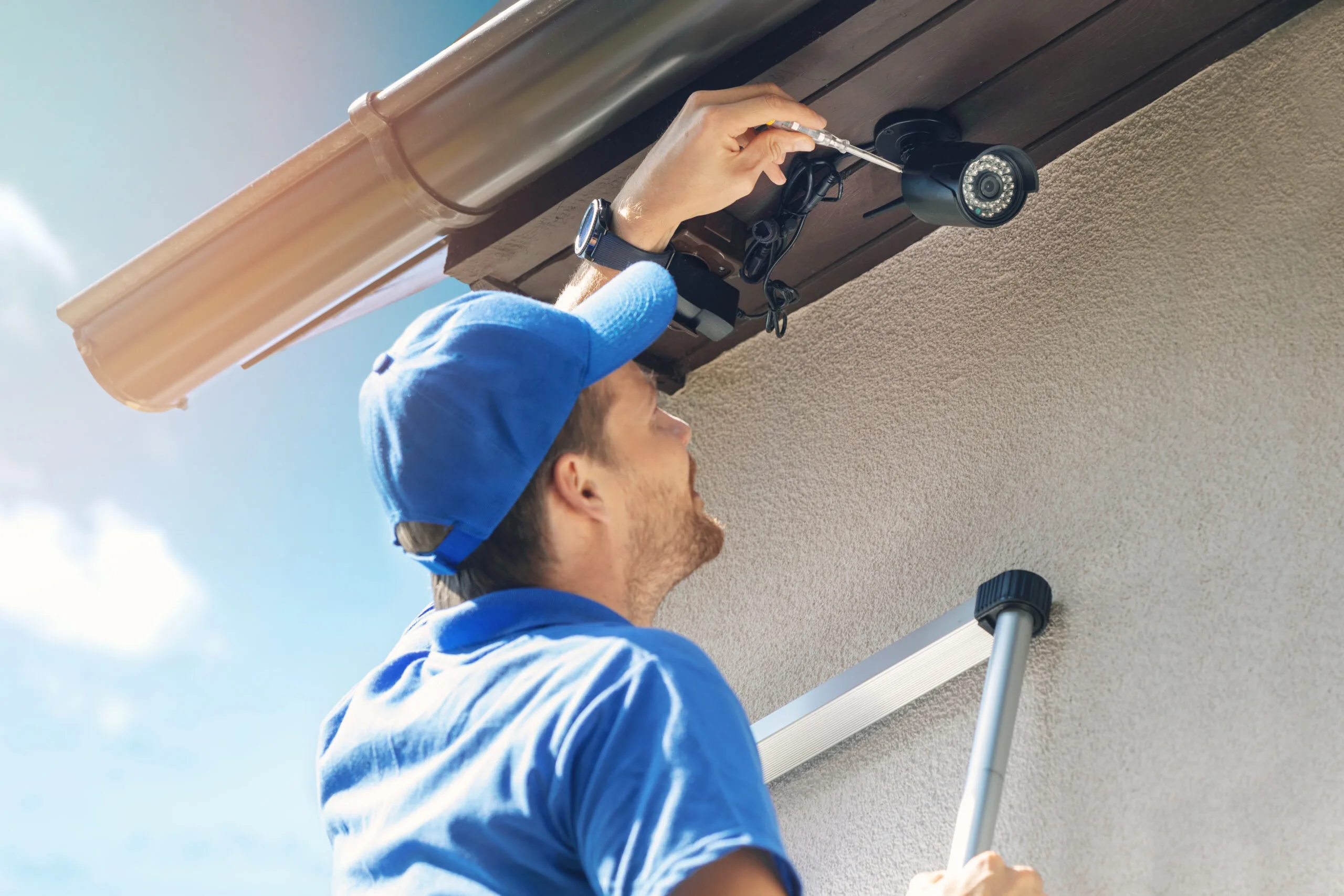tenant hires professional to install a security system camera for home security