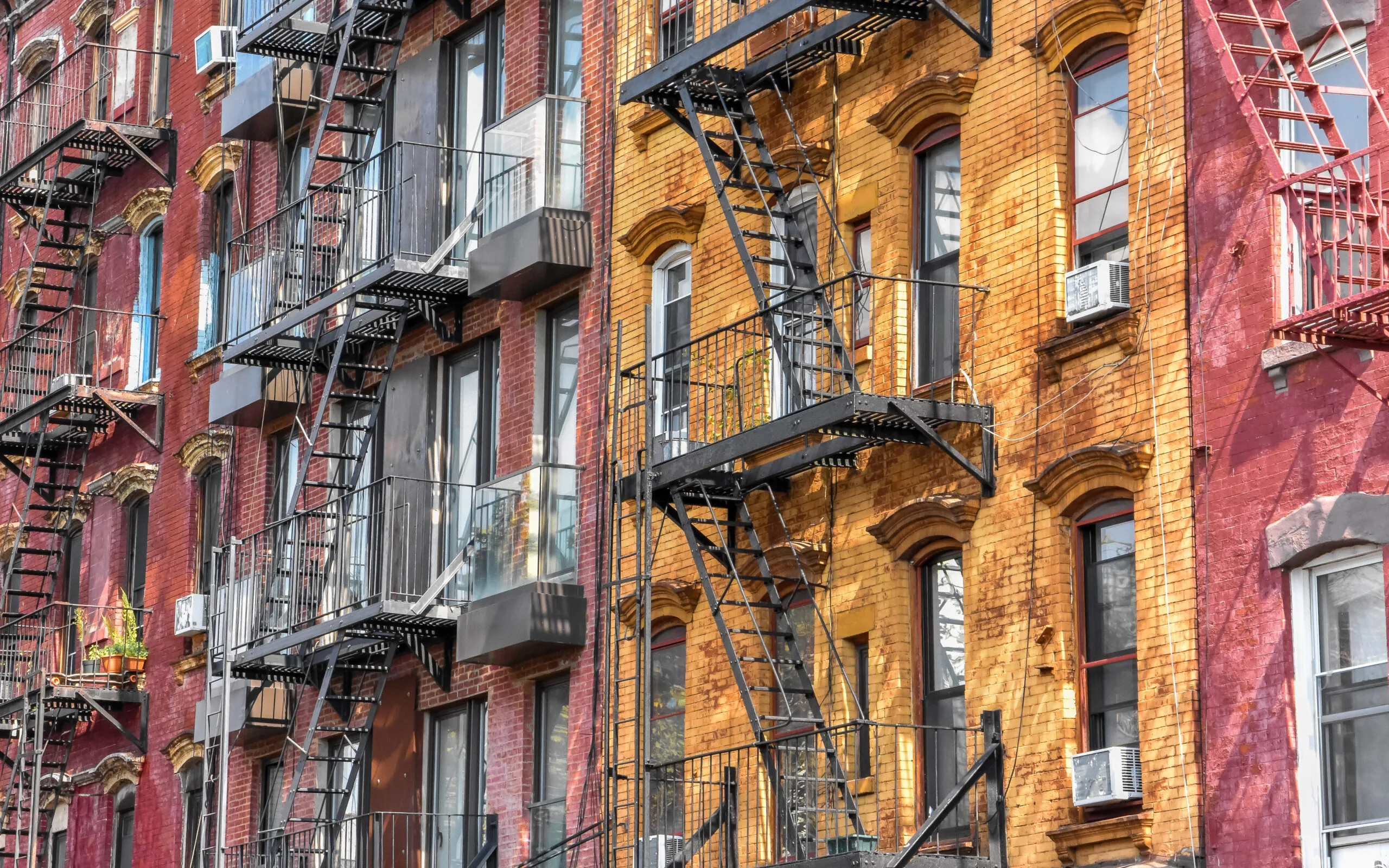 a set of old walk-up apartments