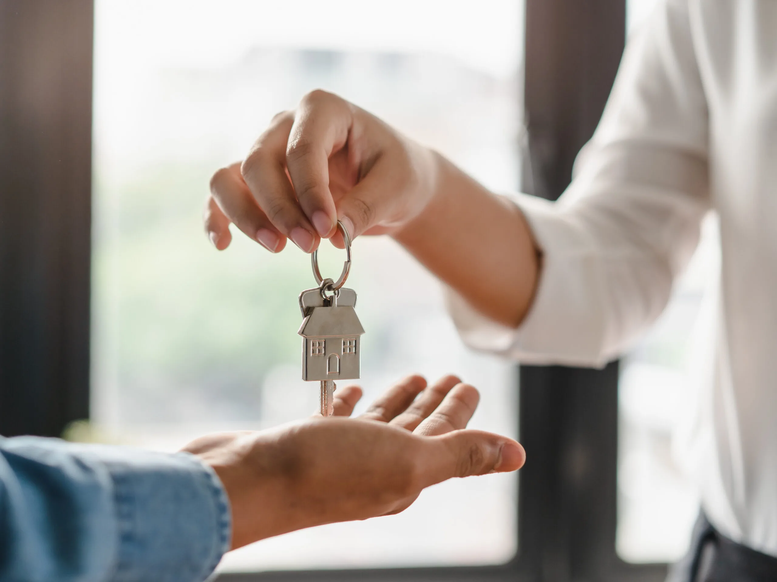 woman holding key