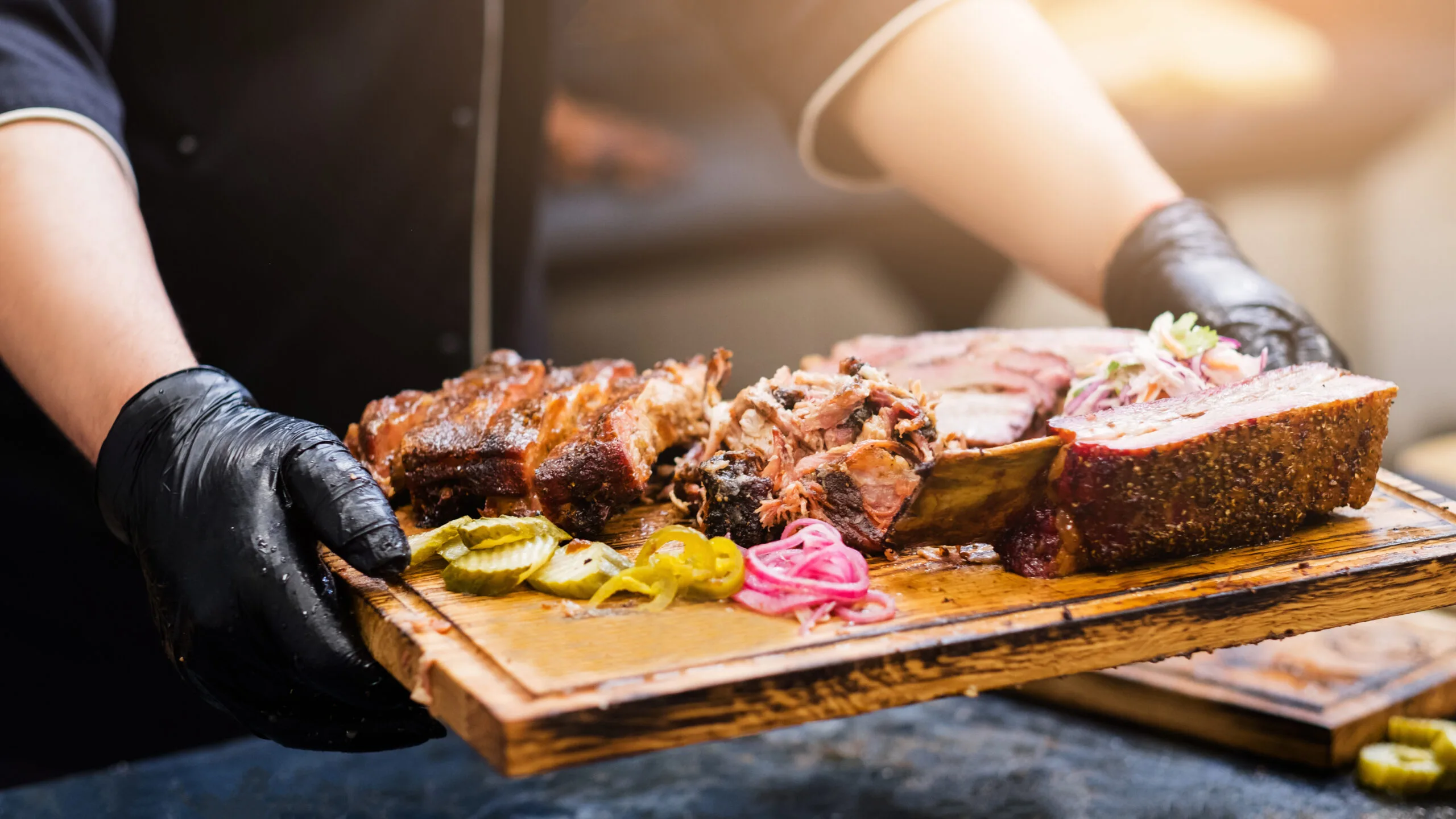 professional catering smoked meat assortment | Bay Management Group Texas